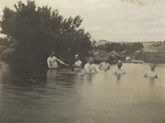 Senators bathing in the Snowy River at Dalgety
