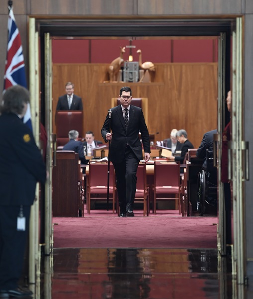 Usher of the Black Rod en route to summon members of the House of Representatives to the Senate