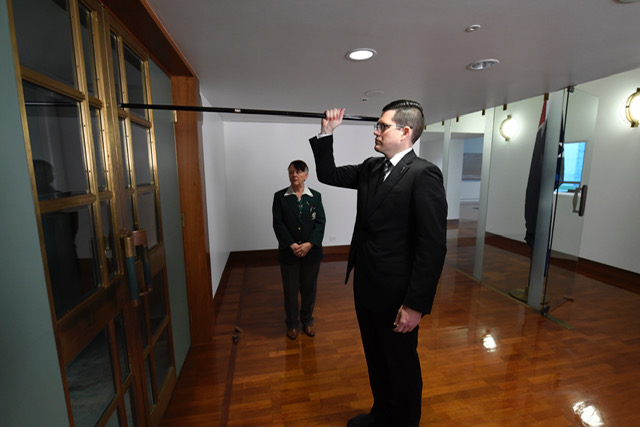 Usher of the Black Rod arriving to summon members to the Senate for the Governor-General’s opening address