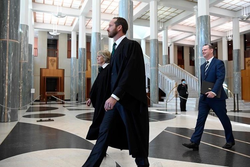 Official Secretary to the Governor-General, Mr Paul Singer MVO, Clerk of the House of Representatives, Claressa Surtees and Deputy Clerk Peter Banson walk through the Marble Foyer for reading of the Proclamation