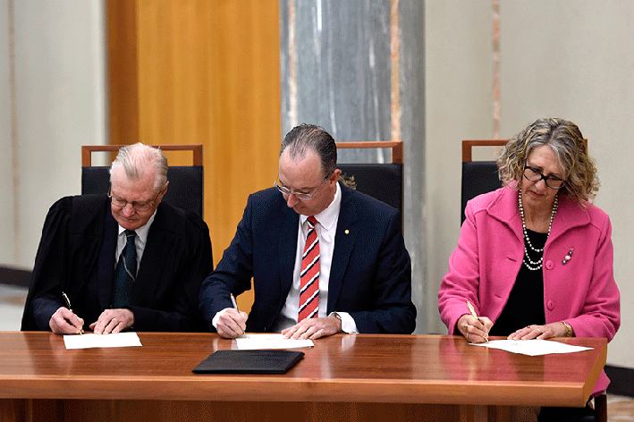 The Official Secretary to the Governor-General, Mr Mark Fraser LVO OAM,  reading the Governor-Generals proclamation to dissolve the House of Representatives and the Senate on the Great Verandah at Parliament House. The Dissolution was witnessed by Clerk of the Senate Rosamary Laing and House of Reps Clerk, David Elder
