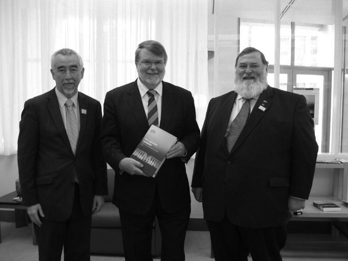 Senator Gary Humphries, Mr Harry Jenkins and Mr Dick Adams launch the 32nd Edition of the Parliamentary Handbook.