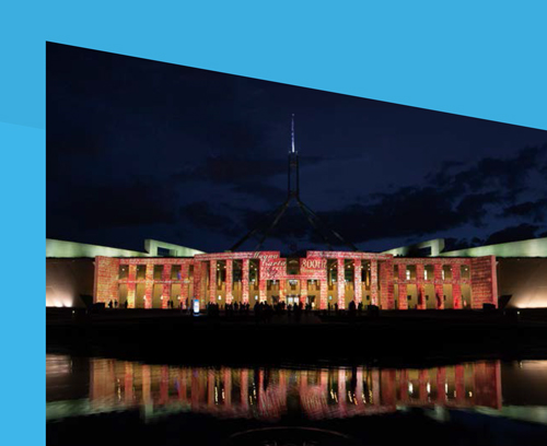 Cover for Part 1 Secretary's review. Image of Parliament House during Enlighten