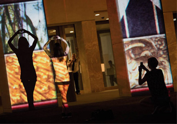 Children enjoying the Enlighten Festival at Parliament House. Artwork by Electric Canvas