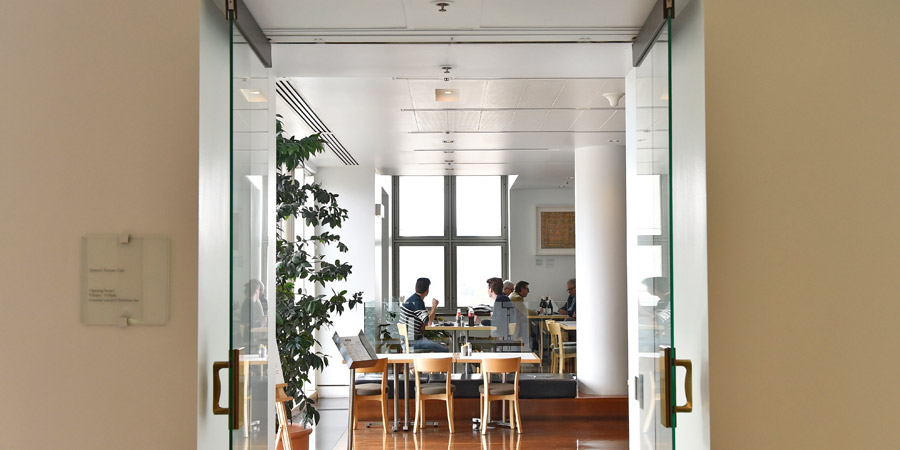 View of diners from the entrance of Queen's Terrace Cafe