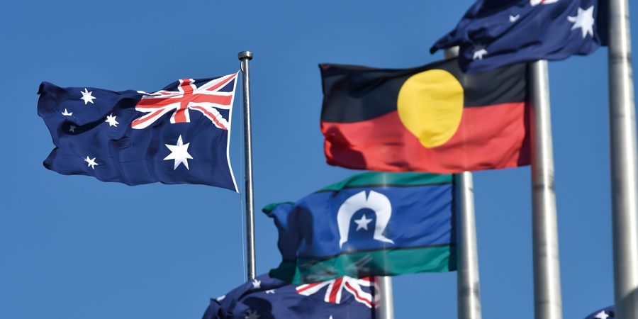 Australian, Aboriginal and Torres Strait Islander flags flying at Australian Parliament House