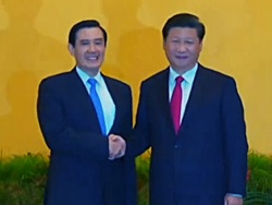 ROC leader Ma Ying-jeou (left) and PRC leader Xi Jinping (right) shake hands during a meeting at the Shangri-La Hotel in Singapore.