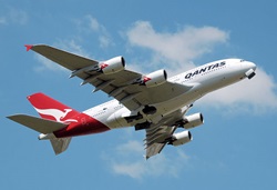 Qantas Airbus A380 (VH-OQA) takes off from London Heathrow Airport, England. The main and nose undercarriage doors have not yet closed.