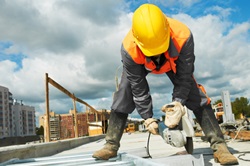 Builder worker with grinder