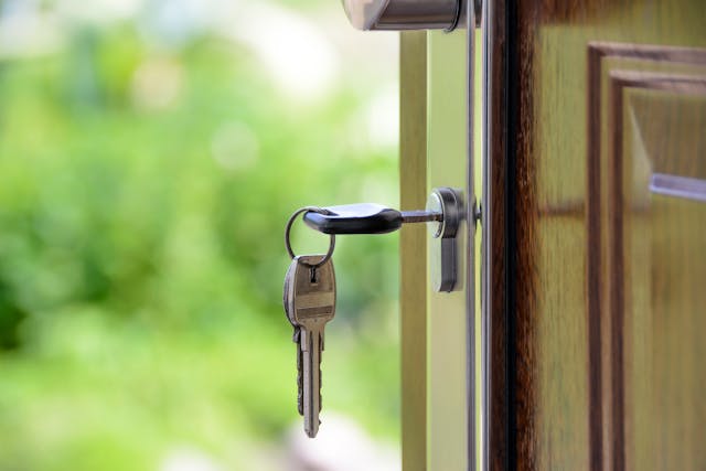 Black-handled key in key hole