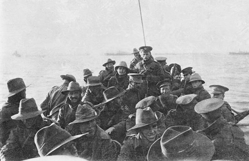 Unidentified men from the 1st Divisional Signal Company being towed towards Anzac Cove on the morning of 25 April 1915.
