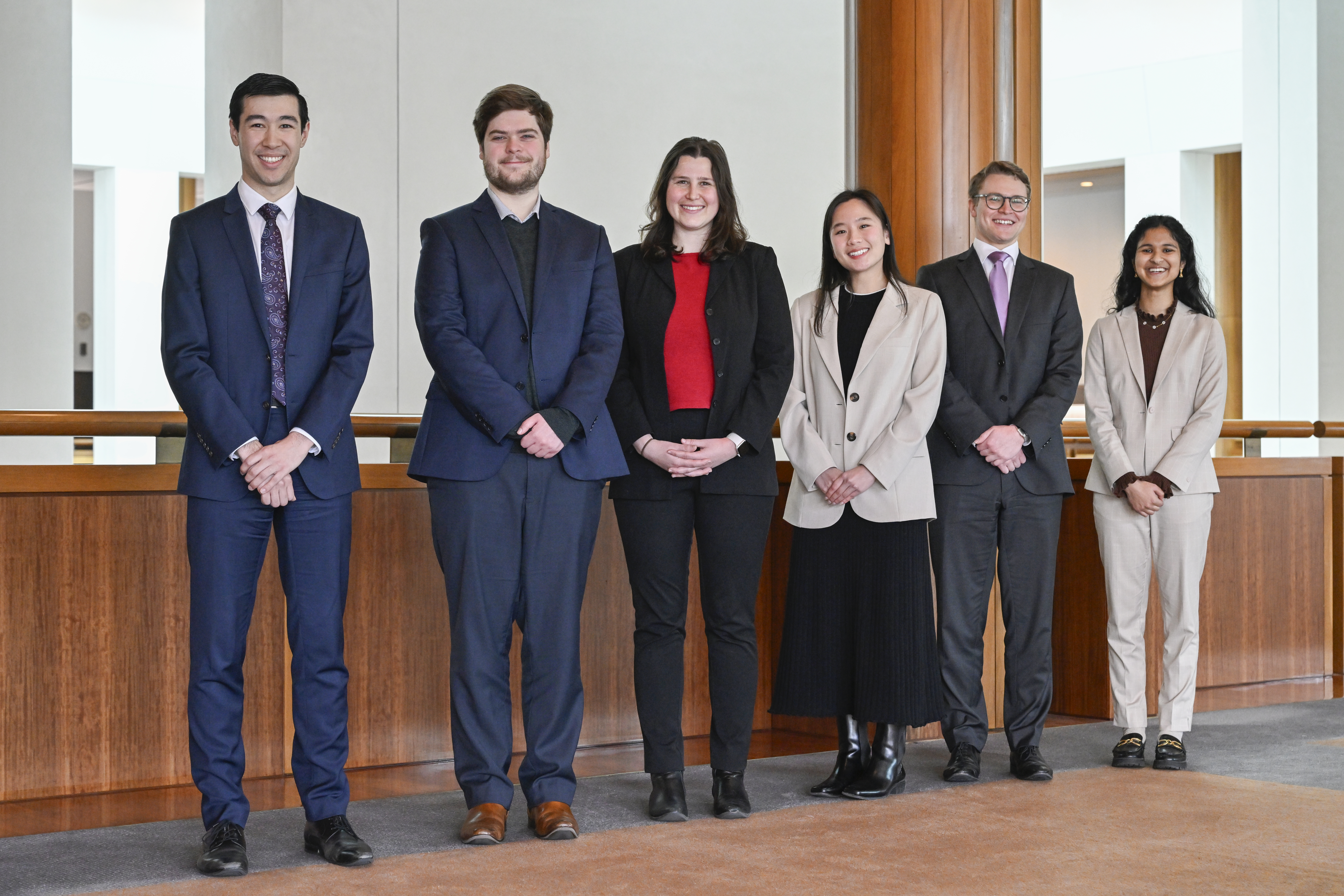 A picture showing 6 young people in professional dress