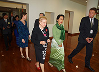 Aung San Suu Kyi and the Speaker depart the House of Representatives Chamber