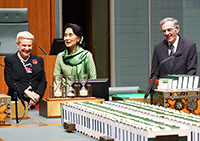 Aung San Suu Kyi with the Speaker and Clerk in the House of Representatives