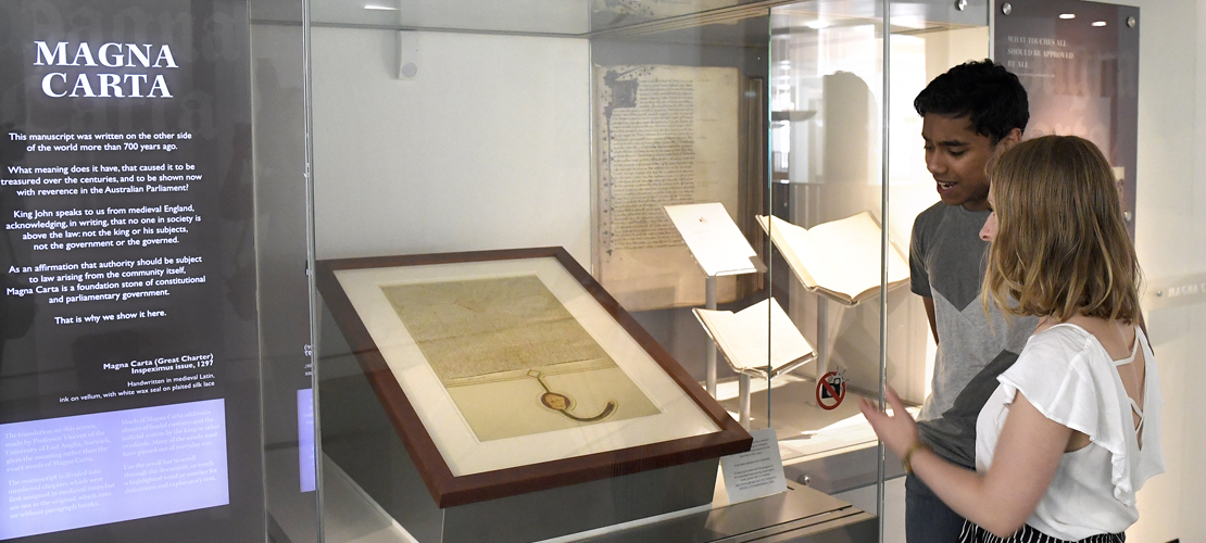 Visitors viewing the Inspeximus issue of the Magna Carta at Parliament House