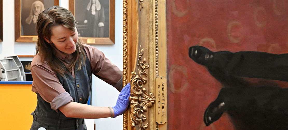 Parliament House Art Collections staff moving artwork