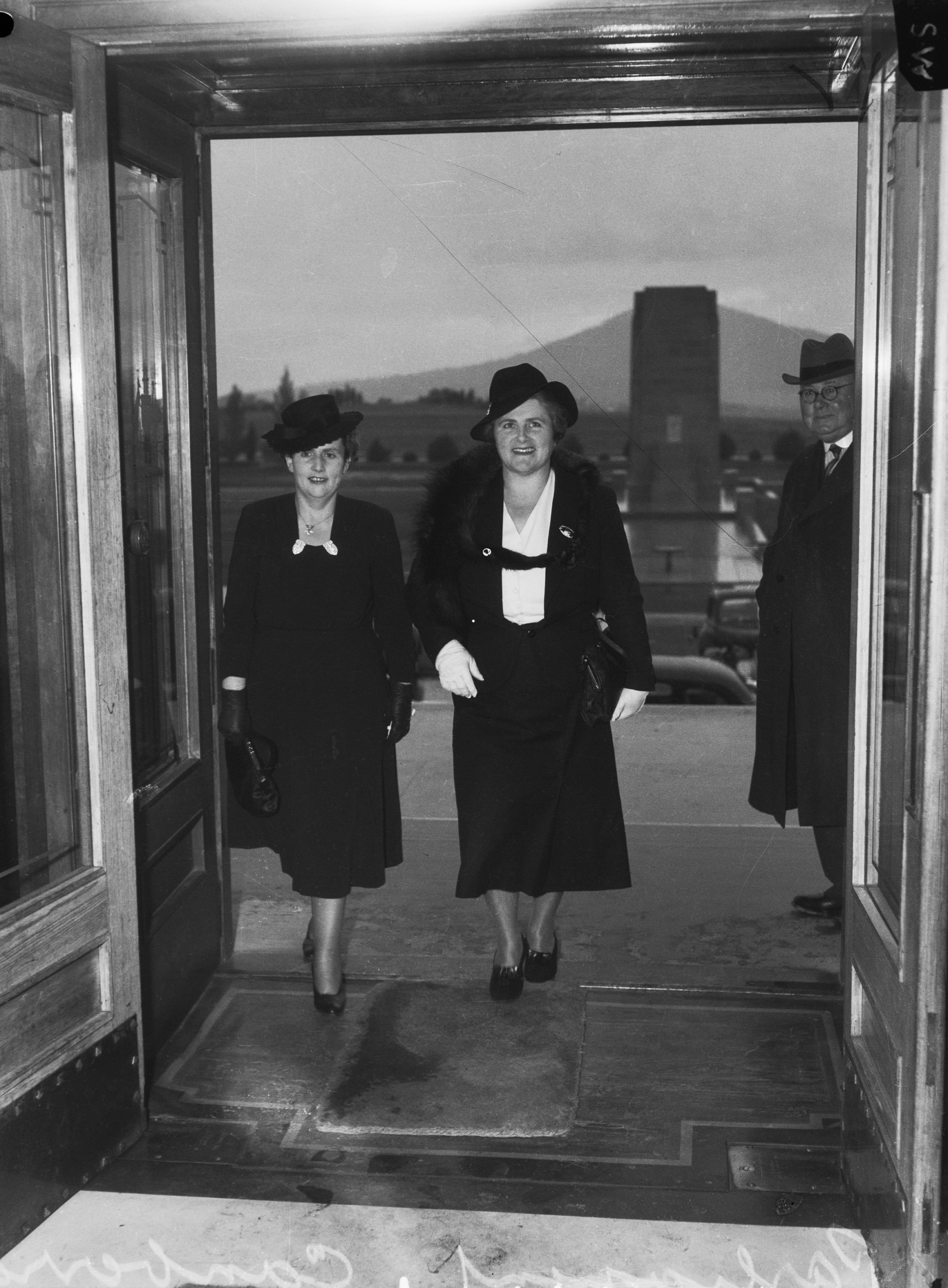 Dorothy Tangney and Dame Enid Lyons entering Parliament House