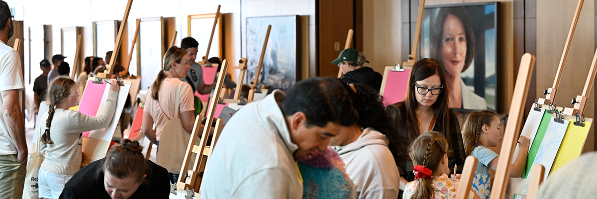 Photo of people making art at Parliament House
