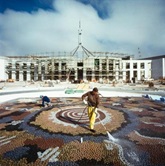 Untitled (a construction worker hosing the completed Michael Nelson Jagamara mosaic in forecourt of Parliament House)