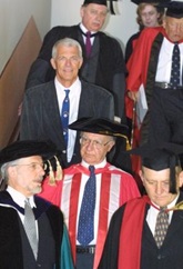 Mr Giurgola followed by Jan Utzon, making their way to the ceremony with the Dean of Architecture, Professor Gary Moore (front, left) and Professor John Carter (front, right), Civil Engineering Adjunct Professor and then Chair of the Academic Board.