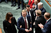 Speaker Tony Smith being conducted to the Speaker’s Chair