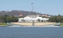 Parliament House with Lake Burley Griffin in the foreground