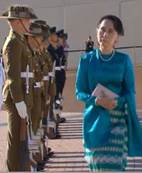 Aung San Suu Kyi during a ceremonial welcome at Parliament House