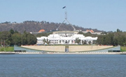 Parliament House with Lake Burley Griffin in the foreground