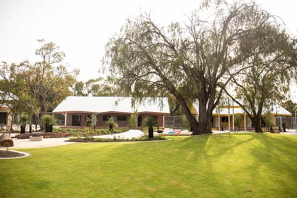 Figure 1.2: View across the central courtyard area to the administrative and activities buildings within the DJC