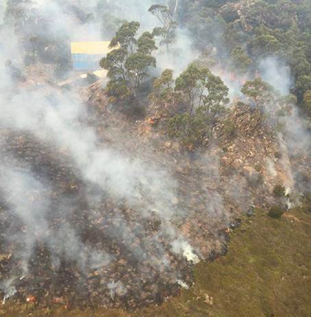 Figure 4.1: Back burning to protect the replica Sandy Lake Hut