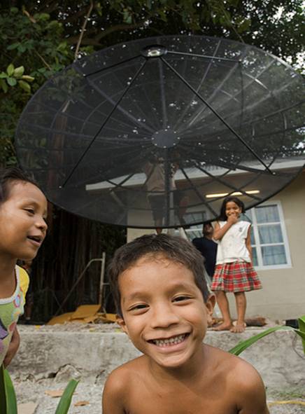Nauru school children with satellite dish